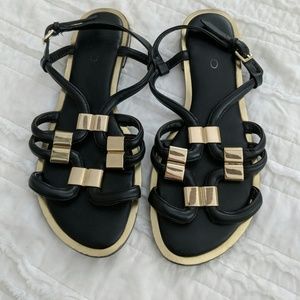 Black and gold sandals